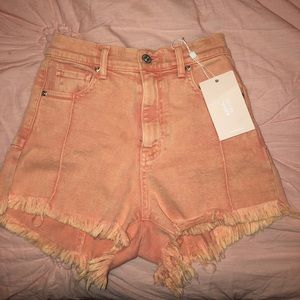 Peach colored revice denim shorts